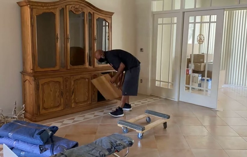 All Aboard Movers crew handling a piece on a San Antonio job