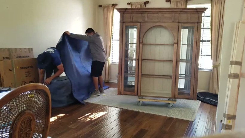 All Aboard Movers crew handling a piece on a San Antonio job